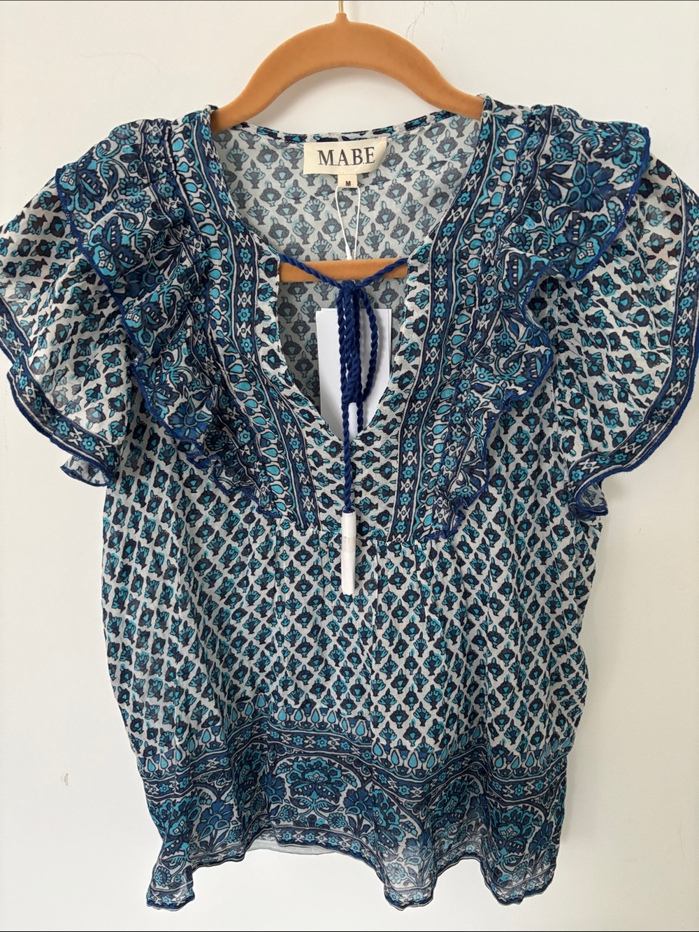 M.A.B.E block print blouse, ruffle cap sleeves, blue/white, tie front, size M